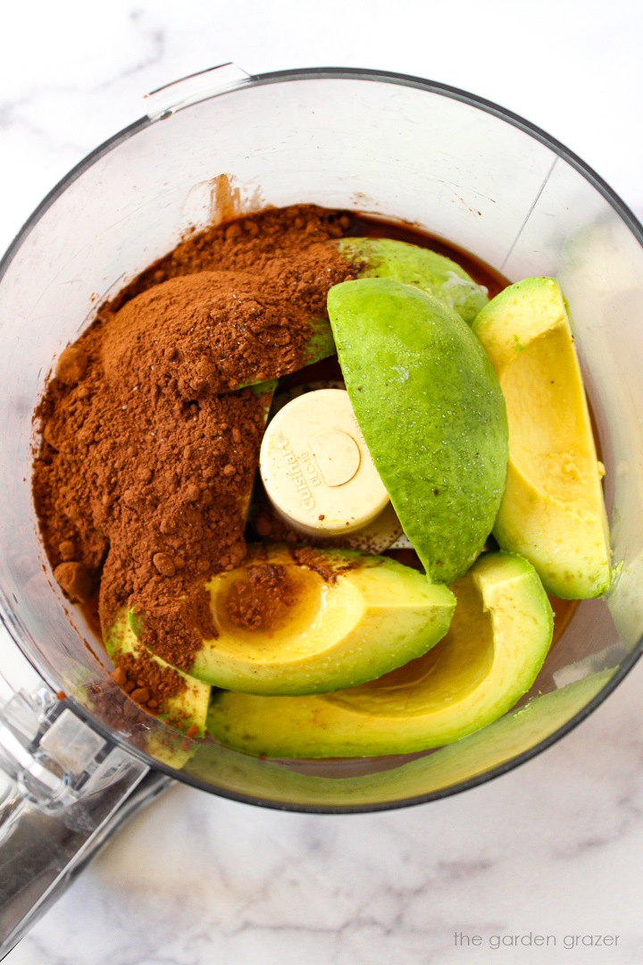 Overhead view of preparing mousse ingredients in a food processor before blending together