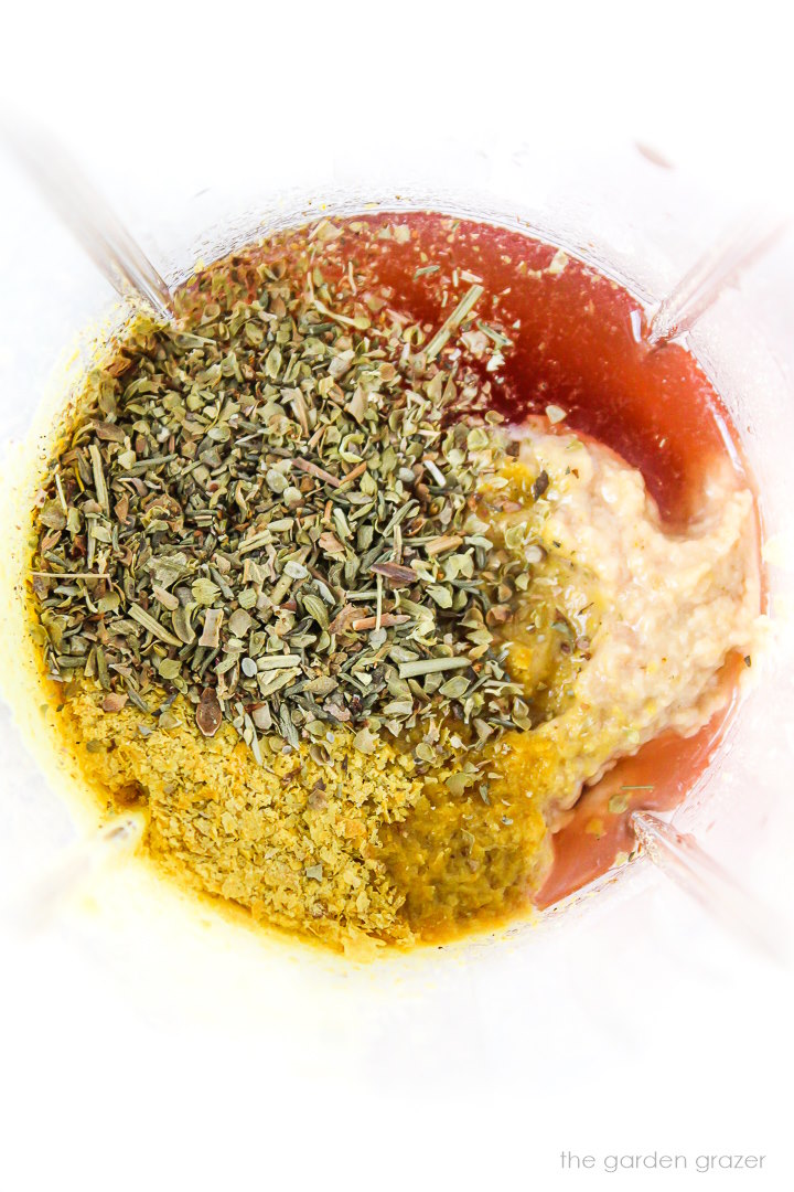 Overhead view of Italian dressing in a blender before blending