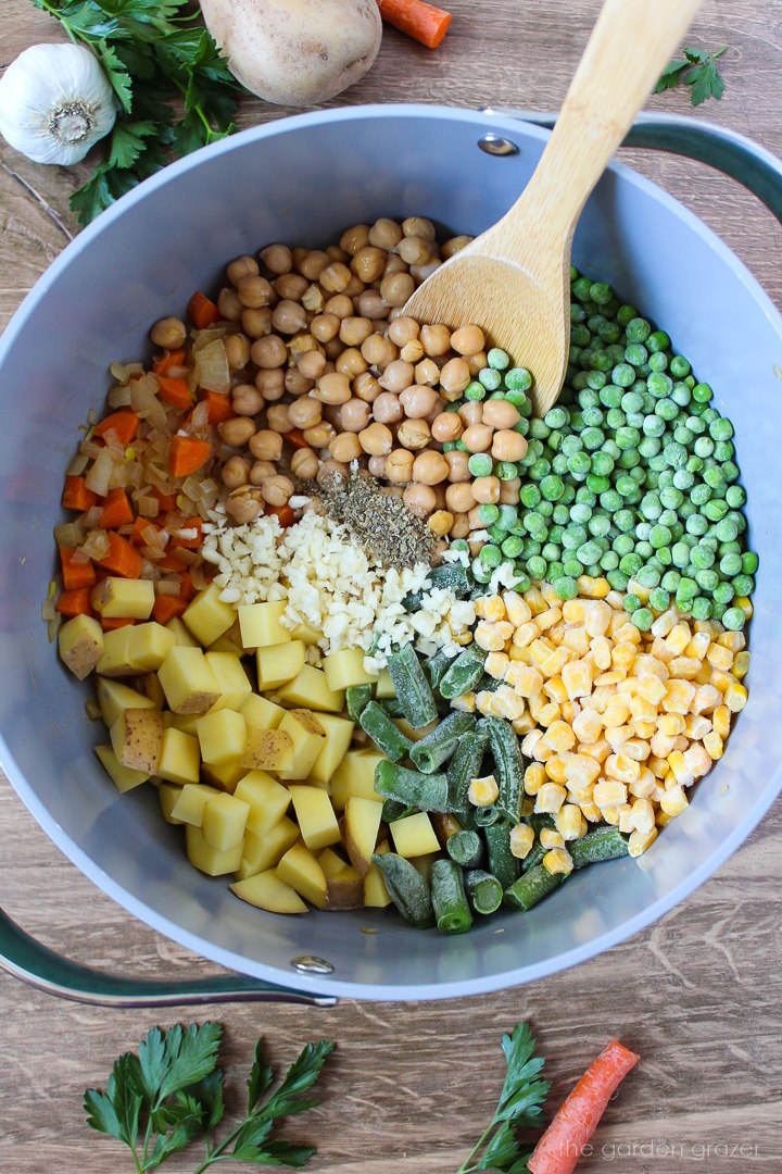 Overhead view of preparing ingredients in a pot before cooking