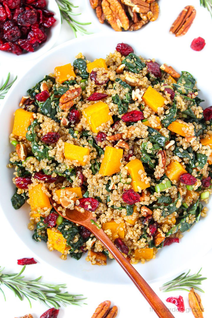 Fall harvest quinoa salad with kale and butternut squash in a white bowl