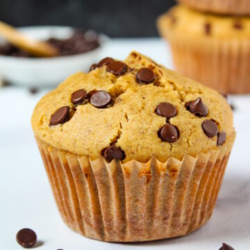 Vegan chocolate chip muffins on a white marble table