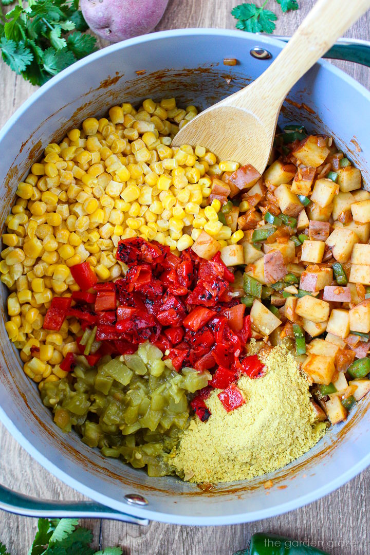 Overhead view of preparing ingredients in a large pot before mixing together