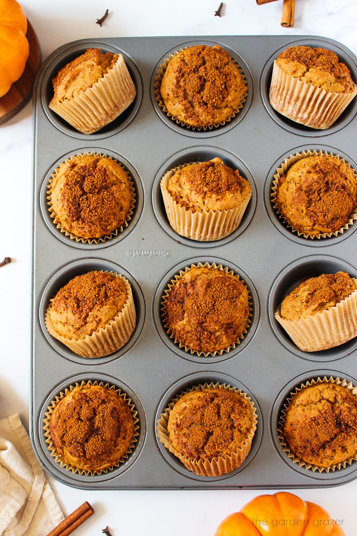 Vegan pumpkin muffins in a pan after baking