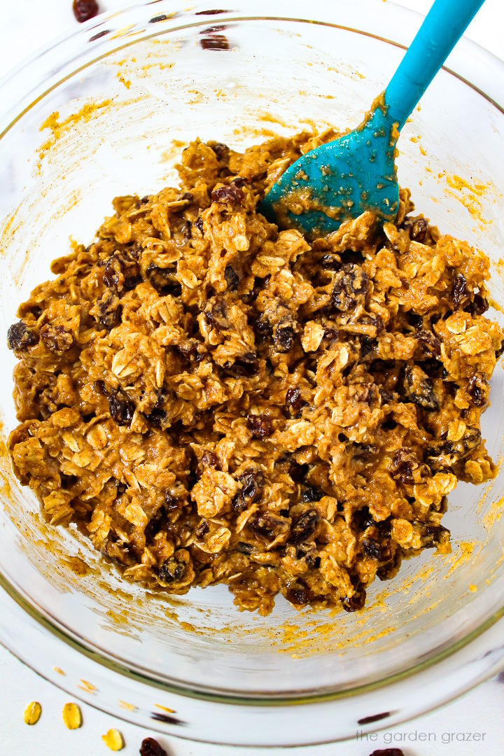 Vegan oatmeal raisin cookie dough batter mixed together in a large bowl