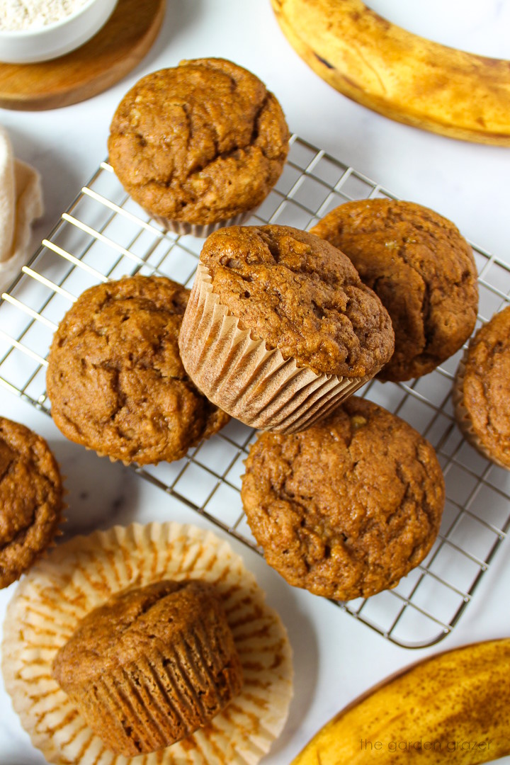 Vegan banana muffins on a cooling rack after baking